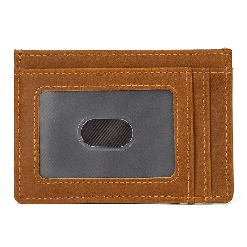 Brown leather cardholder with a gray card pocket on a white background