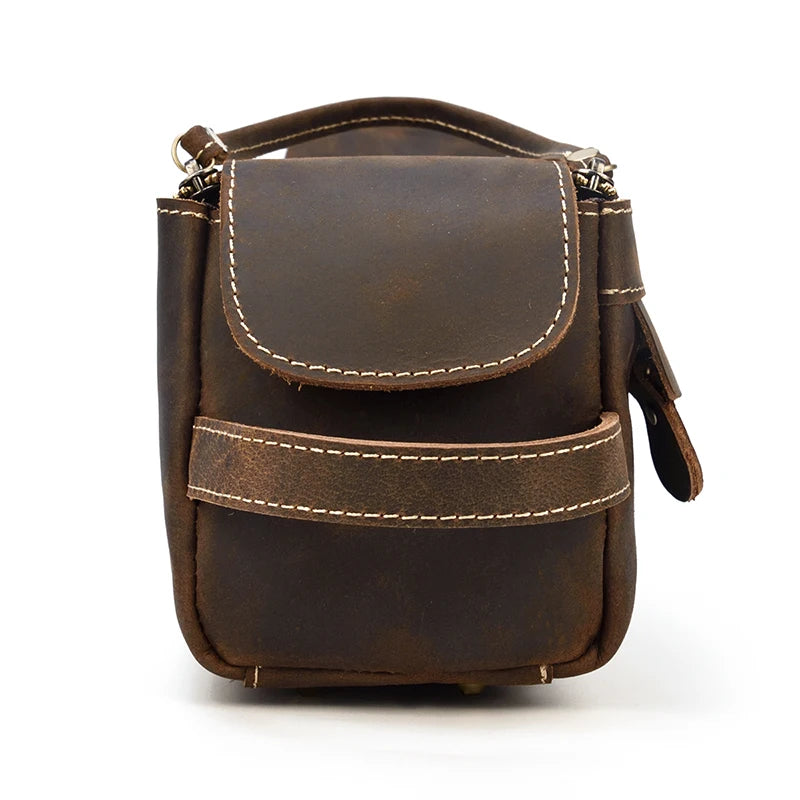 Brown leather bag with a flap on a white background