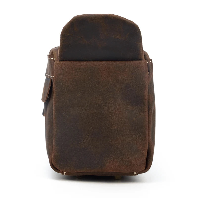 Brown leather backpack on a white background