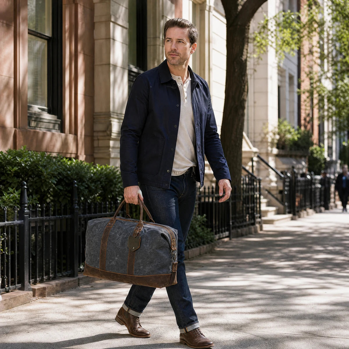 waxed-canvas-duffle-bag-leather-base-gray-worn-meta